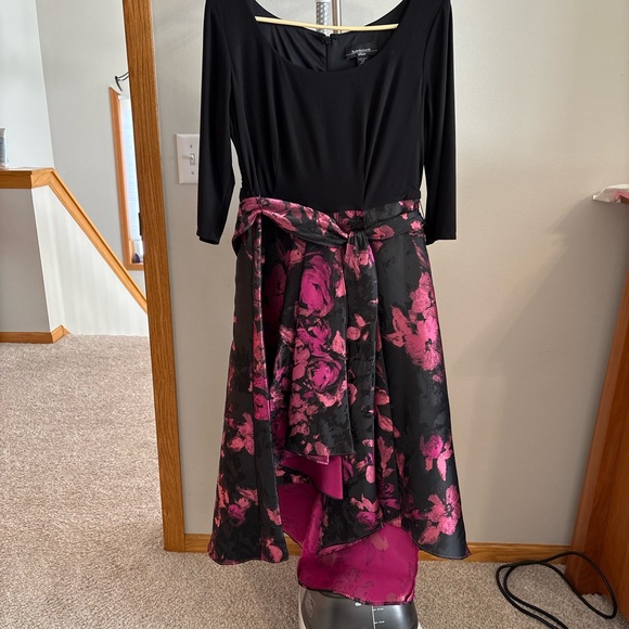 High/low black top with black and pink patterned skirt attached. - Picture 1 of 9